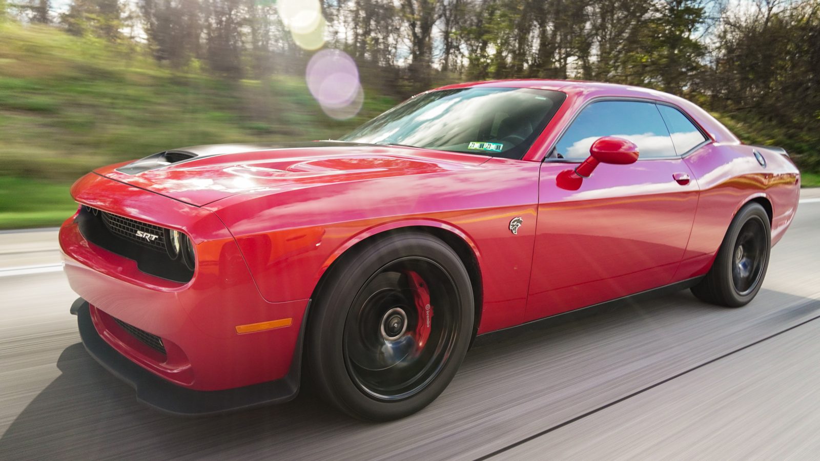 Red Dodge Challenger kept clean on a recurring mobile detailing plan in Baltimore